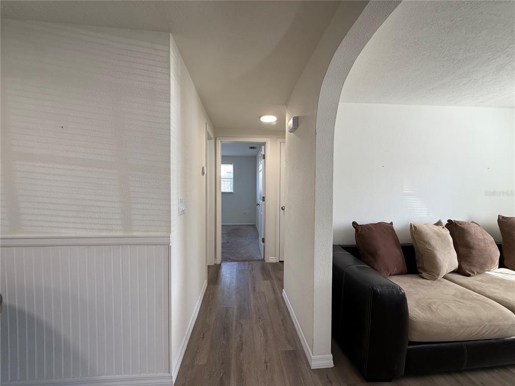 3625 Windham Drive Holiday, FL 34691 - Photo 26 of 28 a living room with furniture and a wooden floor