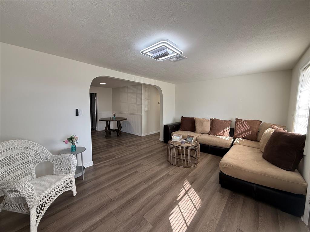 3625 Windham Drive Holiday, FL 34691 - Photo 27 of 28 a living room with furniture and a wooden floor