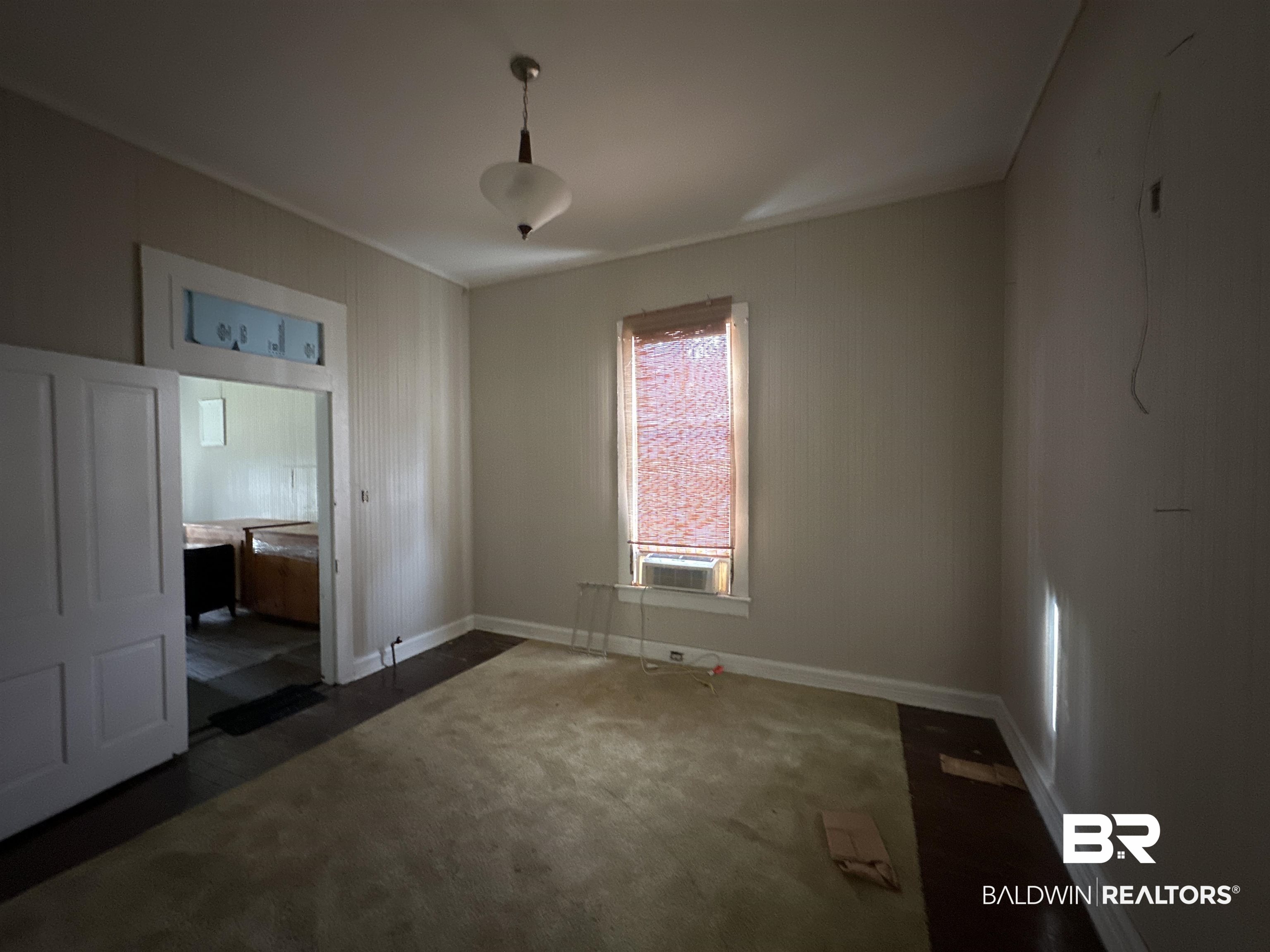 1119 Old Shell Road Mobile, AL 36604 - Photo 16 of 22 Spare room featuring cooling unit and dark carpet