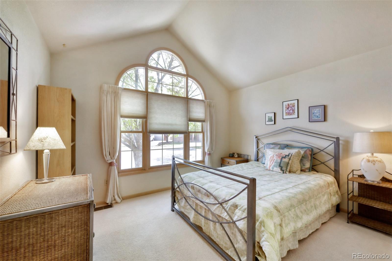 4823 Greenwich Place Highlands Ranch, CO 80130 - Photo 5 of 28 a bedroom with a bed and a window