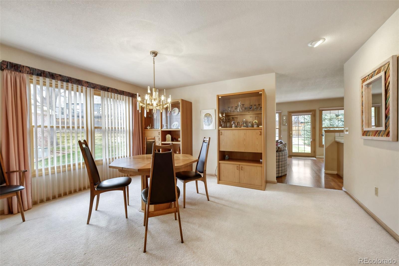 4823 Greenwich Place Highlands Ranch, CO 80130 - Photo 10 of 28 a view of a dining room with furniture window and outside view