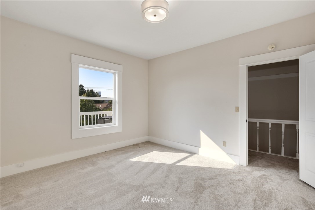 162 18th Avenue Seattle, WA 98122 - Photo 21 of 38 an empty room with windows
