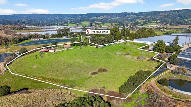 a view of a swimming pool and lake view