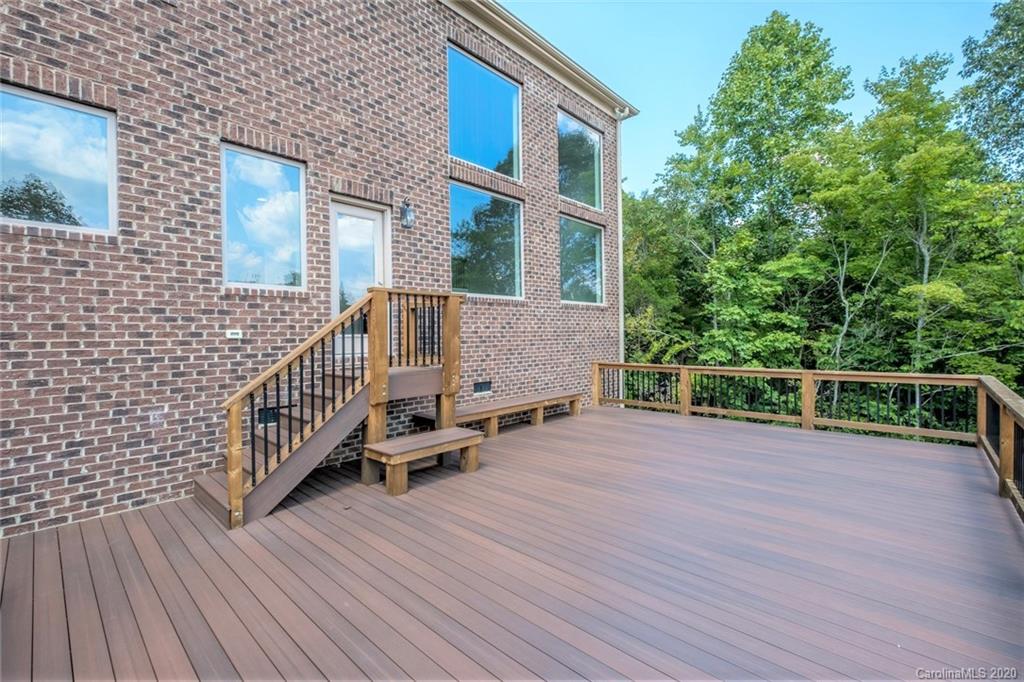 133 Overlook Ridge Lane Davidson, NC 28036 - Photo 21 of 35 a view of a house with a deck and backyard