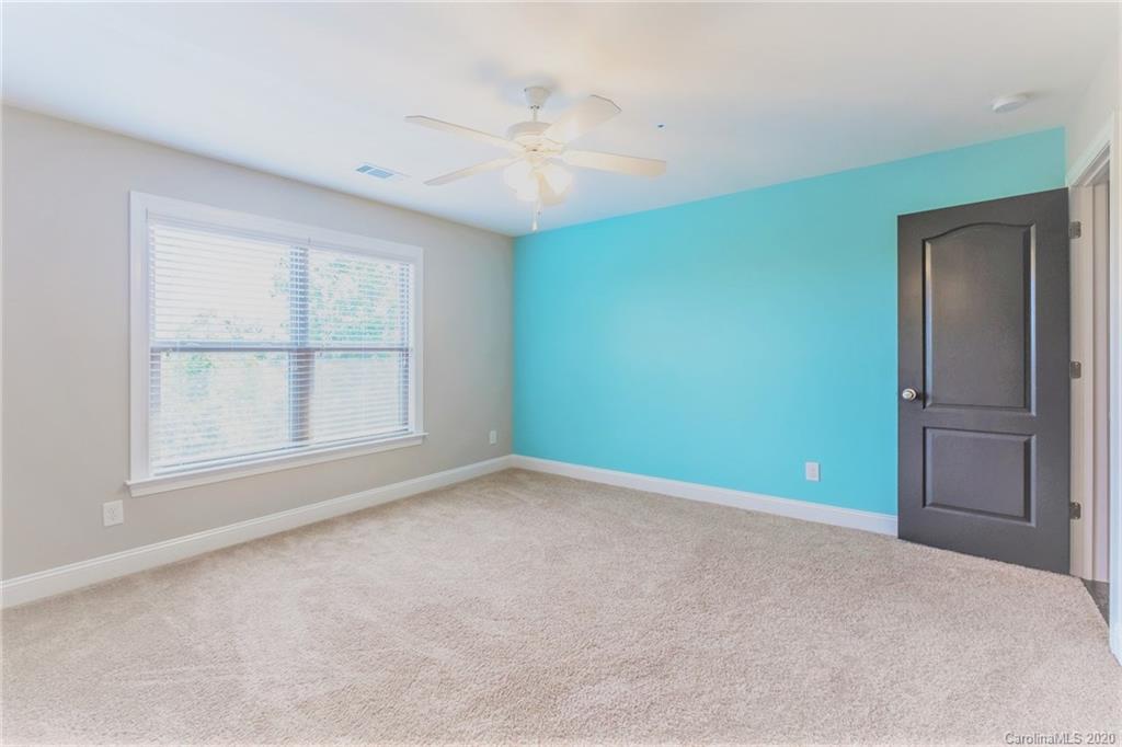 133 Overlook Ridge Lane Davidson, NC 28036 - Photo 30 of 35 an empty room with windows and closet