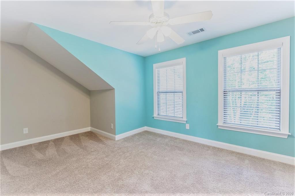 133 Overlook Ridge Lane Davidson, NC 28036 - Photo 32 of 35 an empty room with windows and closet