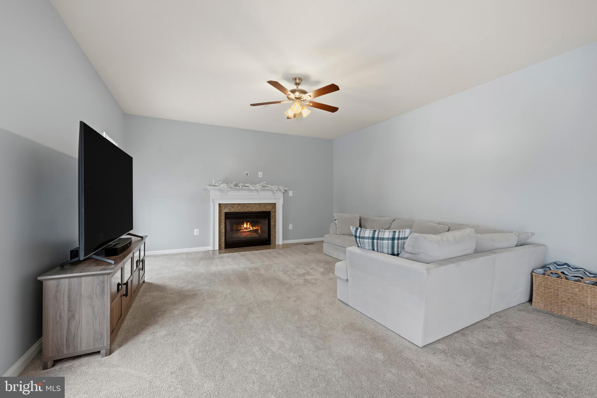 3007 Bender Ridge Court Baltimore, MD 21234 - Photo 13 of 39 a living room with furniture and a fireplace