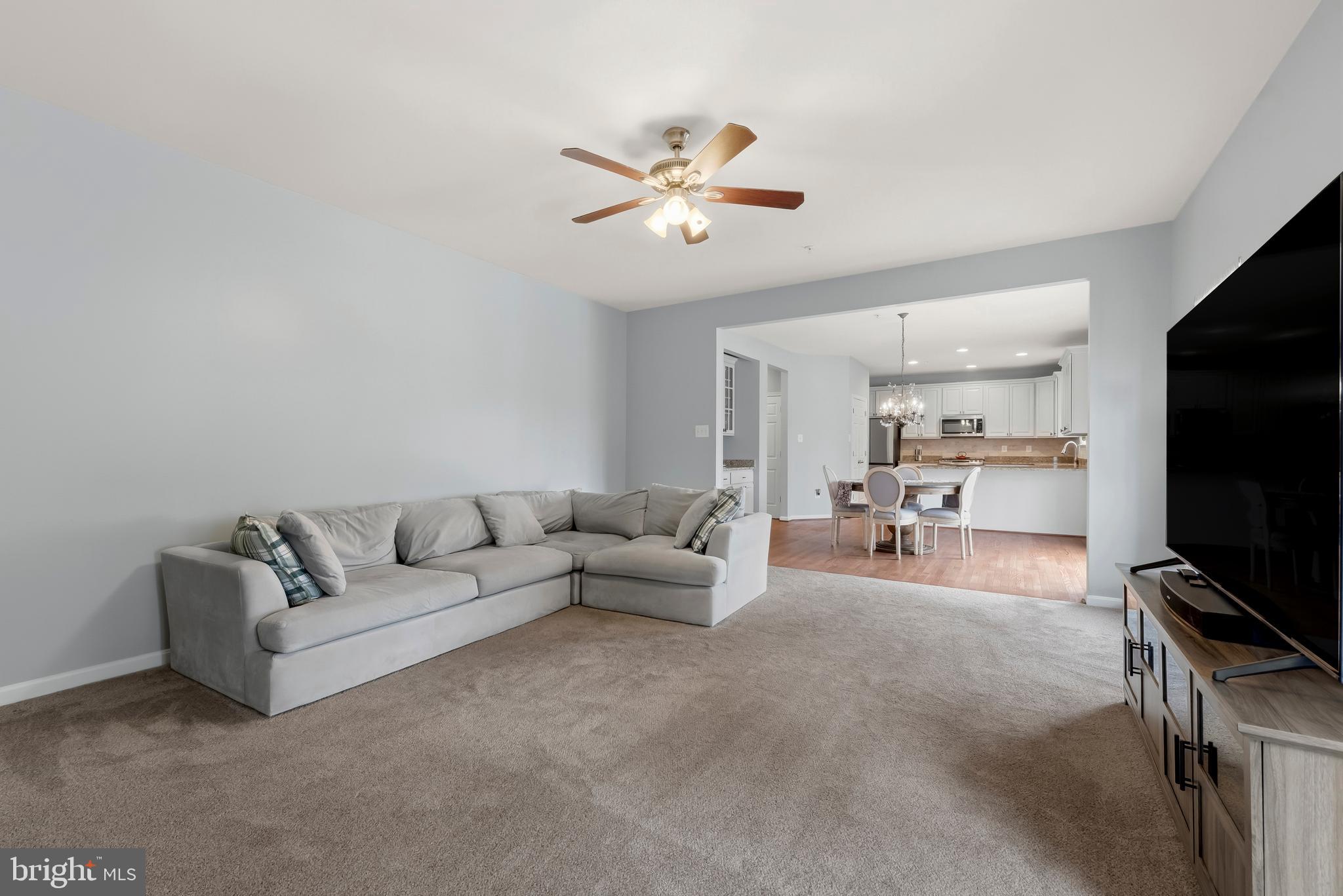 3007 Bender Ridge Court Baltimore, MD 21234 - Photo 14 of 39 a living room with furniture and a flat screen tv