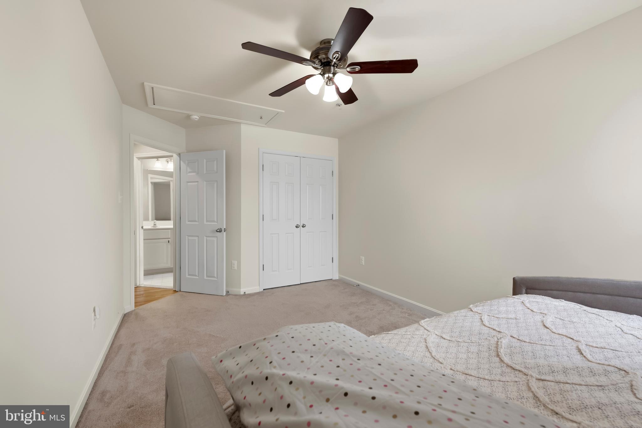 3007 Bender Ridge Court Baltimore, MD 21234 - Photo 22 of 39 a bedroom with a bed and a ceiling fan
