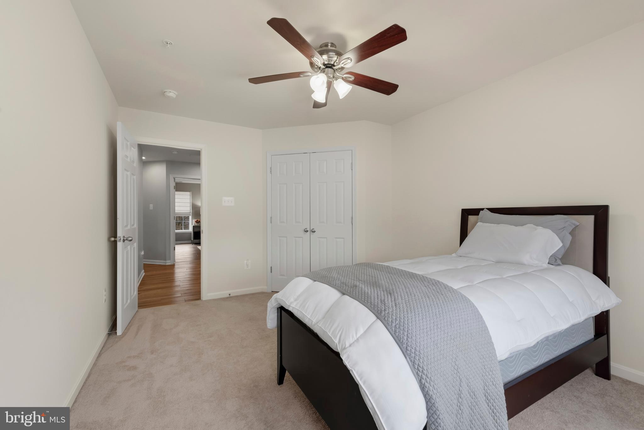 3007 Bender Ridge Court Baltimore, MD 21234 - Photo 24 of 39 a bedroom with bed and window