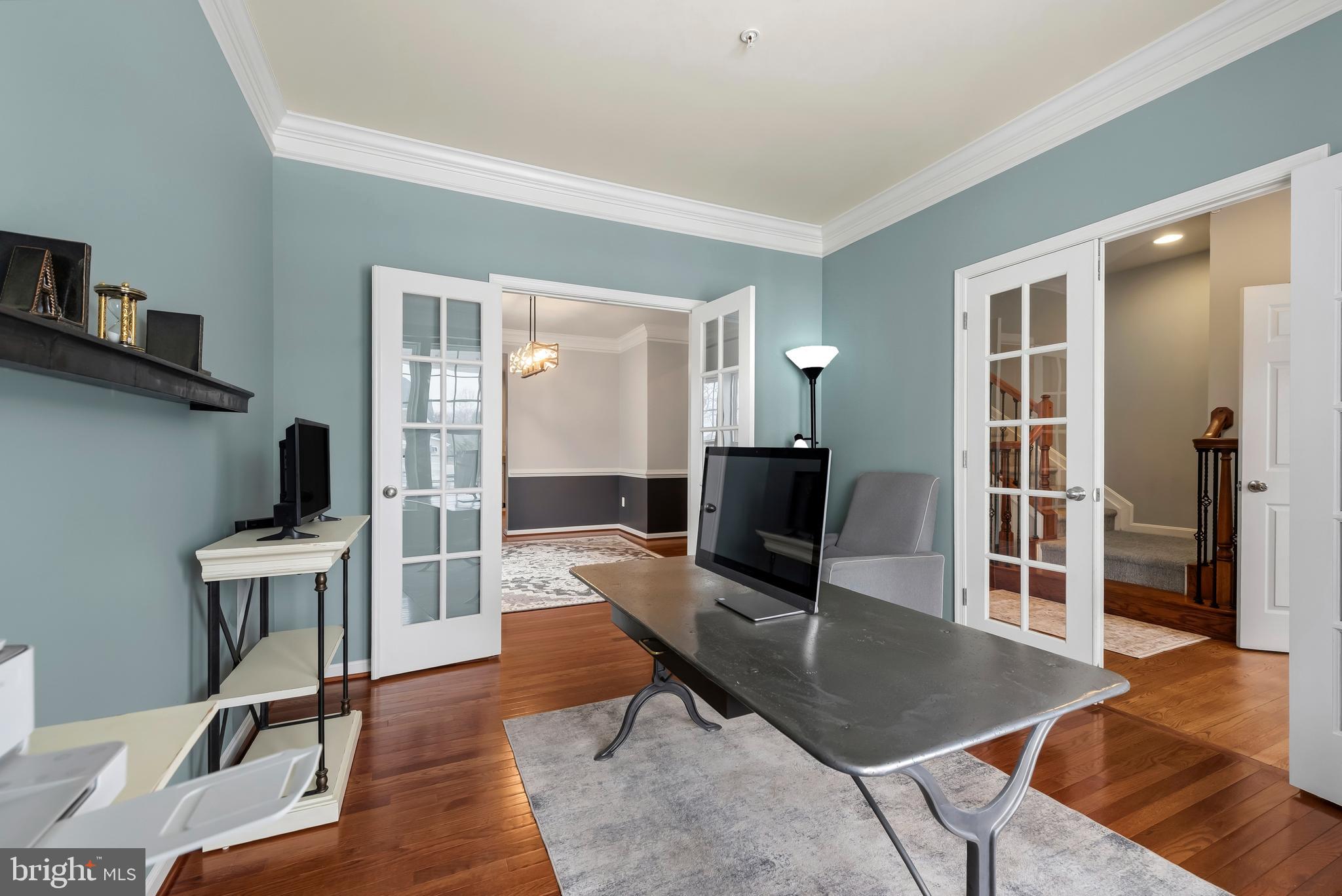3007 Bender Ridge Court Baltimore, MD 21234 - Photo 3 of 39 a workspace with furniture hardwood and a kitchen