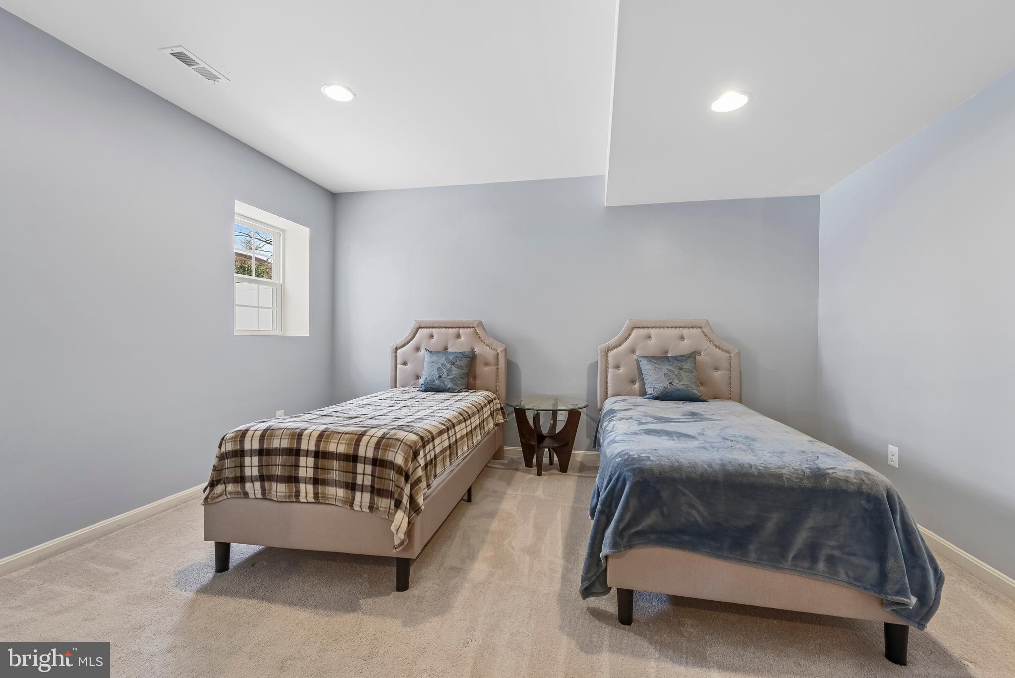 3007 Bender Ridge Court Baltimore, MD 21234 - Photo 31 of 39 a bedroom with two beds and a window