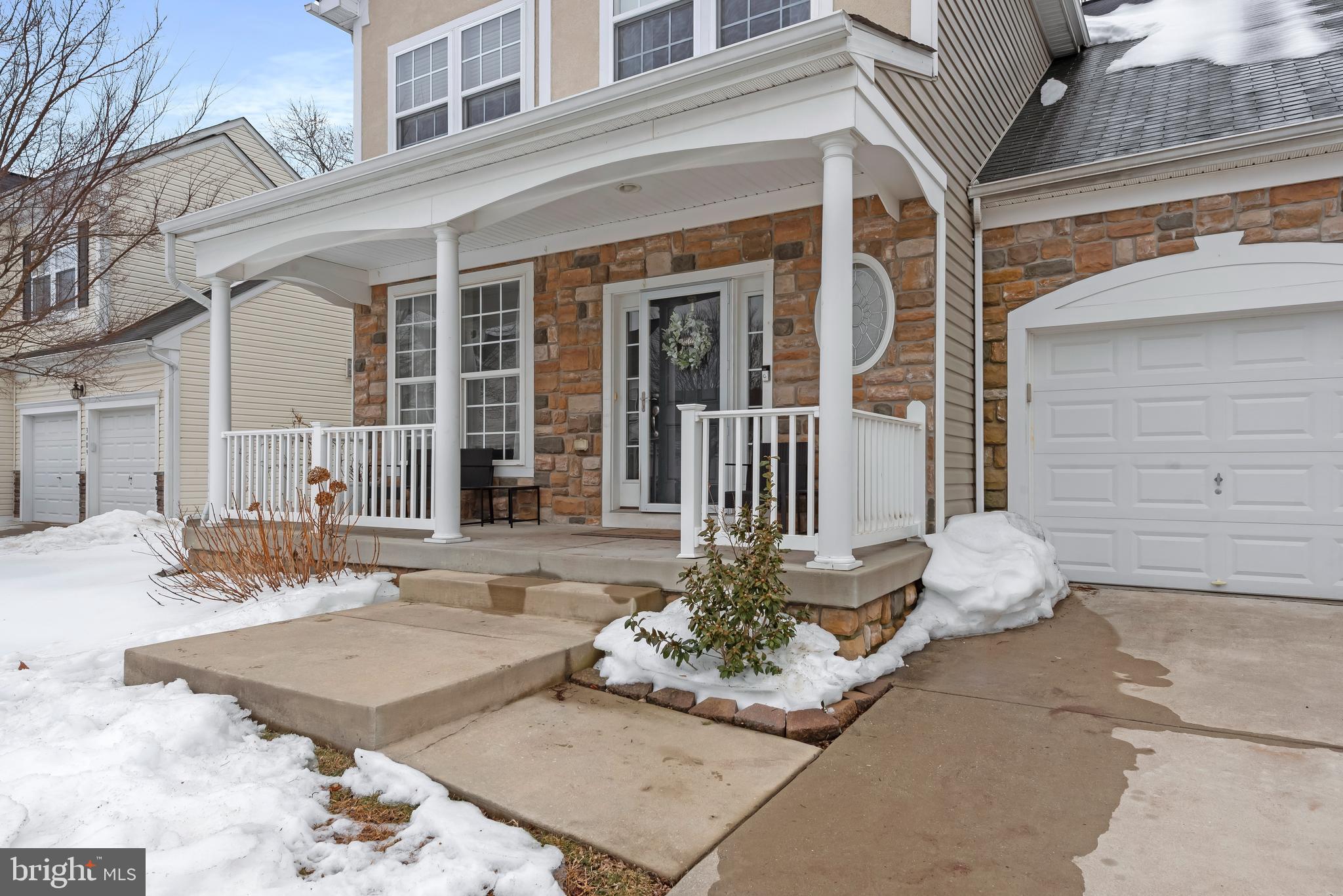 3007 Bender Ridge Court Baltimore, MD 21234 - Photo 36 of 39 front view of a house with a bench in front of house