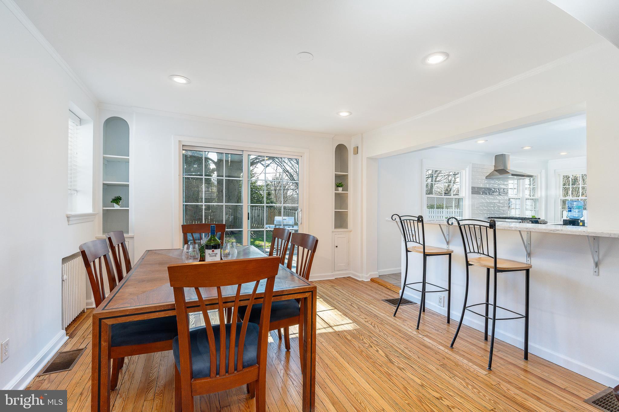 1208 Andover Road Wynnewood, PA 19096 - Photo 13 of 31 a dining room with furniture and wooden floor