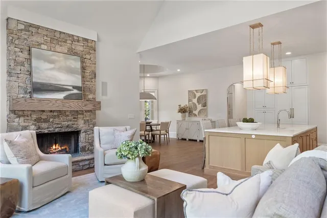 a living room with furniture and windows