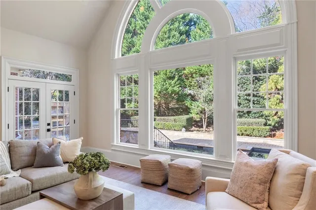 a spacious bedroom with a bed and a couch