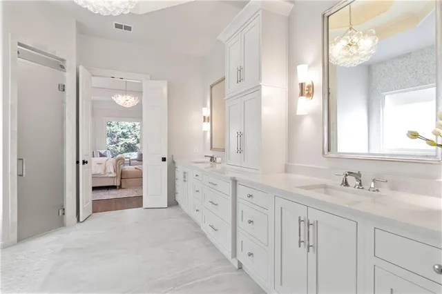 a view of a livingroom with wooden floor and furniture