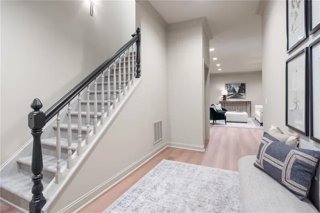 a living room with furniture and a table