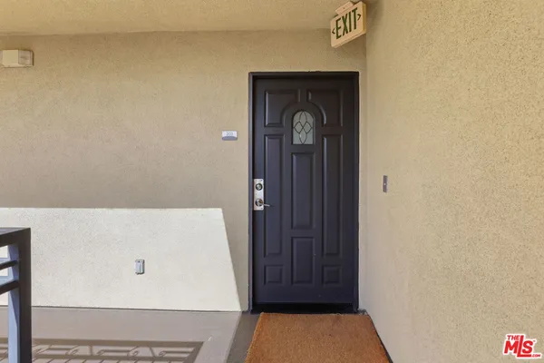 a view of an entryway with a hallway