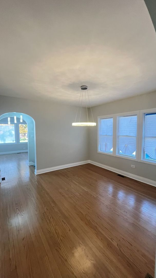 1201 South 15th Avenue Maywood, IL 60153 - Photo 5 of 28 wooden floor in an empty room