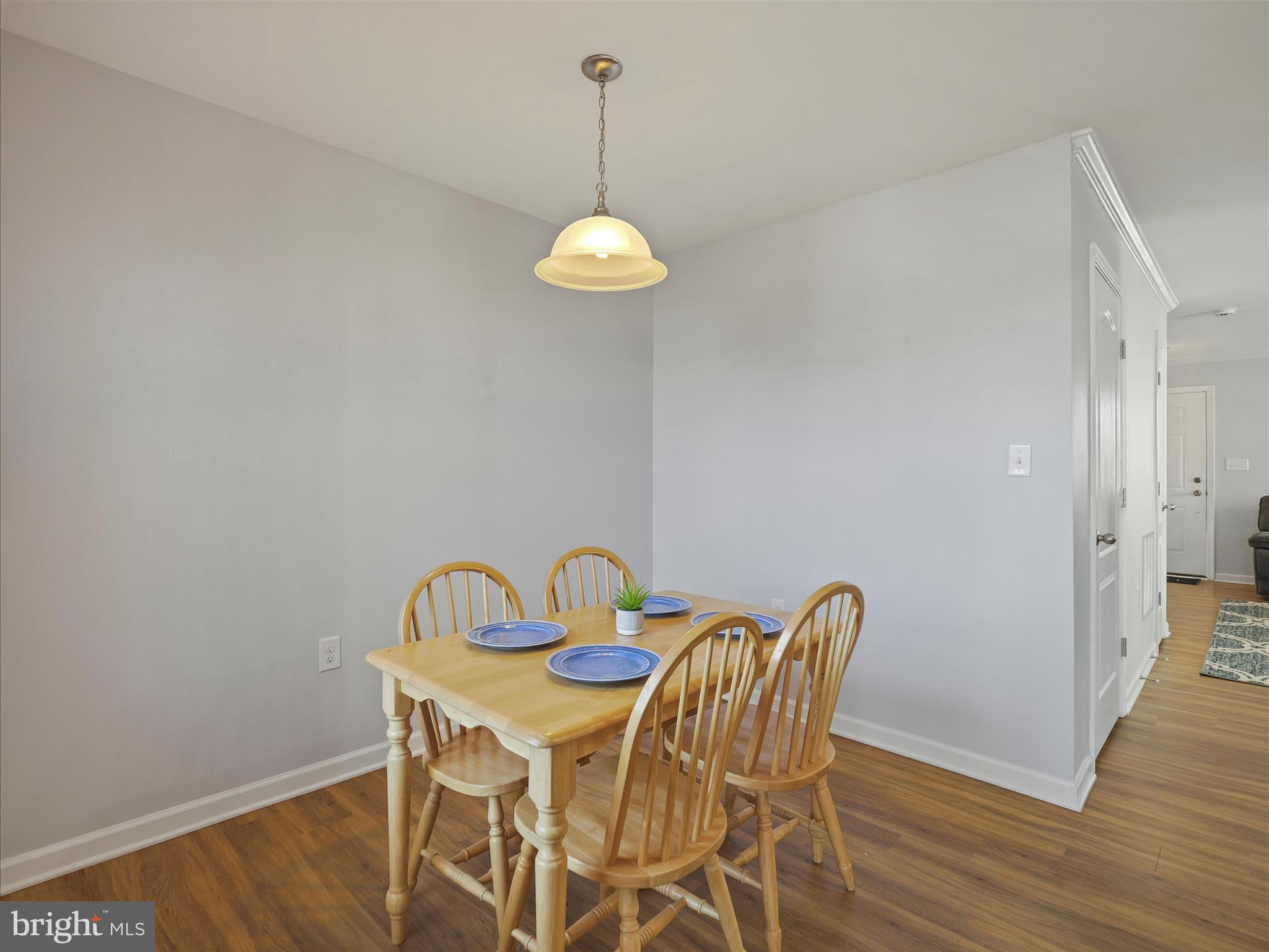 1142 Stallion Street Ranson, WV 25438 - Photo 13 of 31 a view of a dining room with furniture and wooden floor