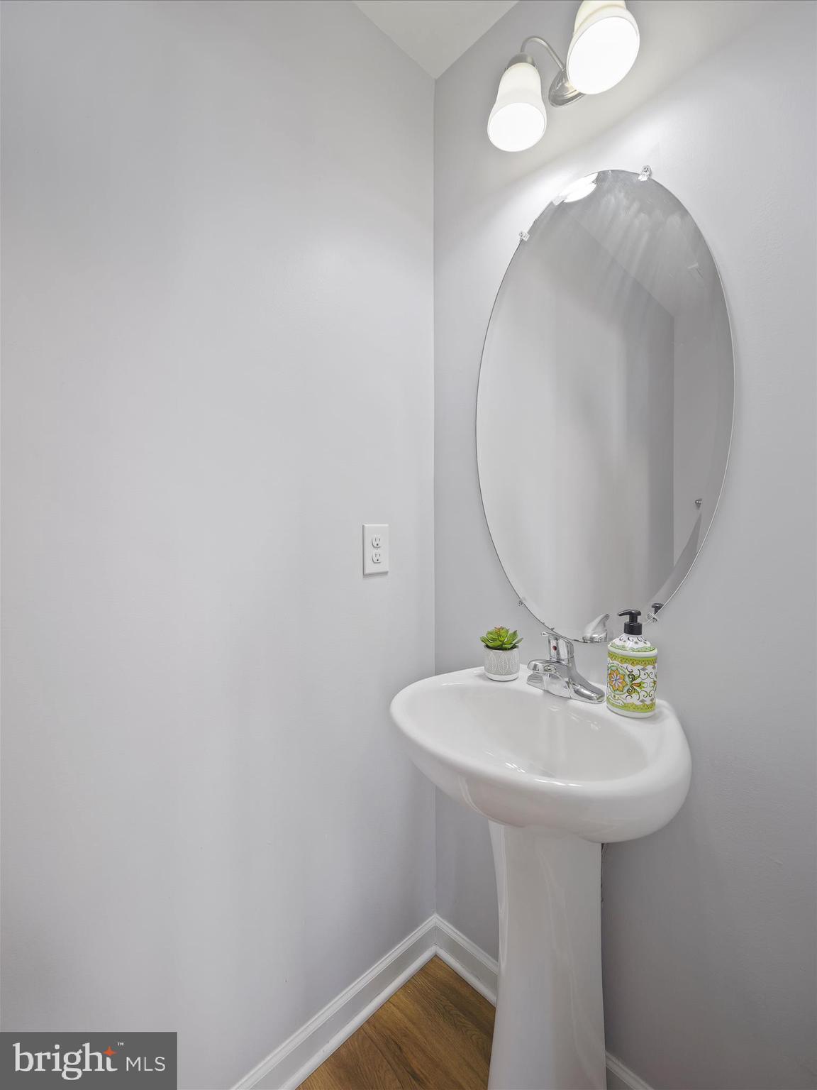 1142 Stallion Street Ranson, WV 25438 - Photo 17 of 31 a bathroom with a sink a mirror and a toilet