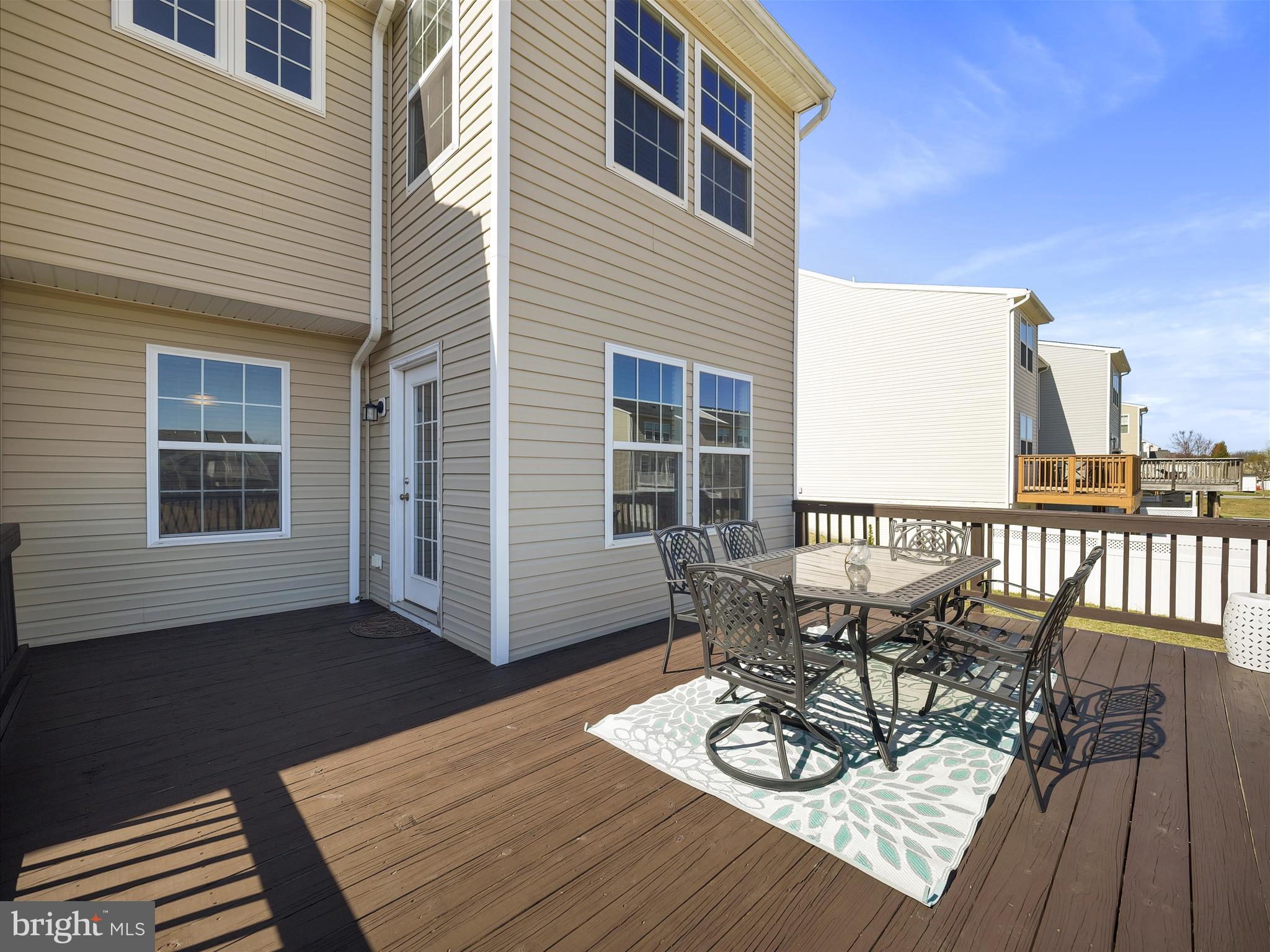 1142 Stallion Street Ranson, WV 25438 - Photo 20 of 31 a view of a patio with a table and chairs