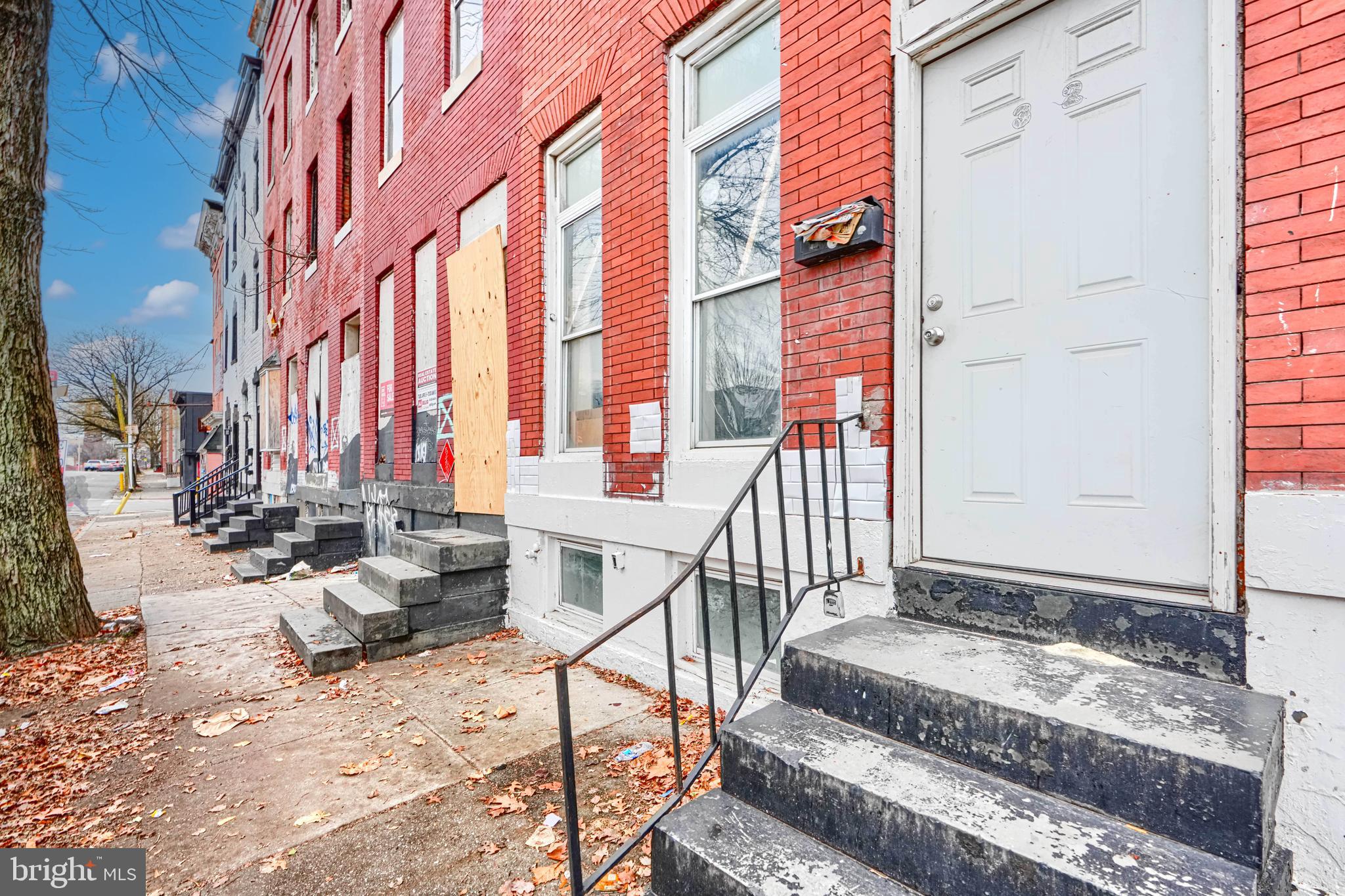 a view of a building with sitting area