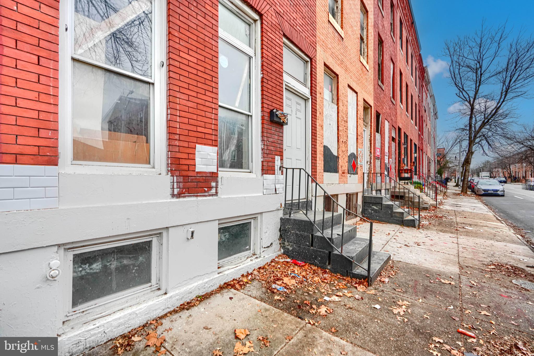 1312 Aisquith Street Baltimore, MD 21202 - Photo 2 of 25 a view of a building with many windows