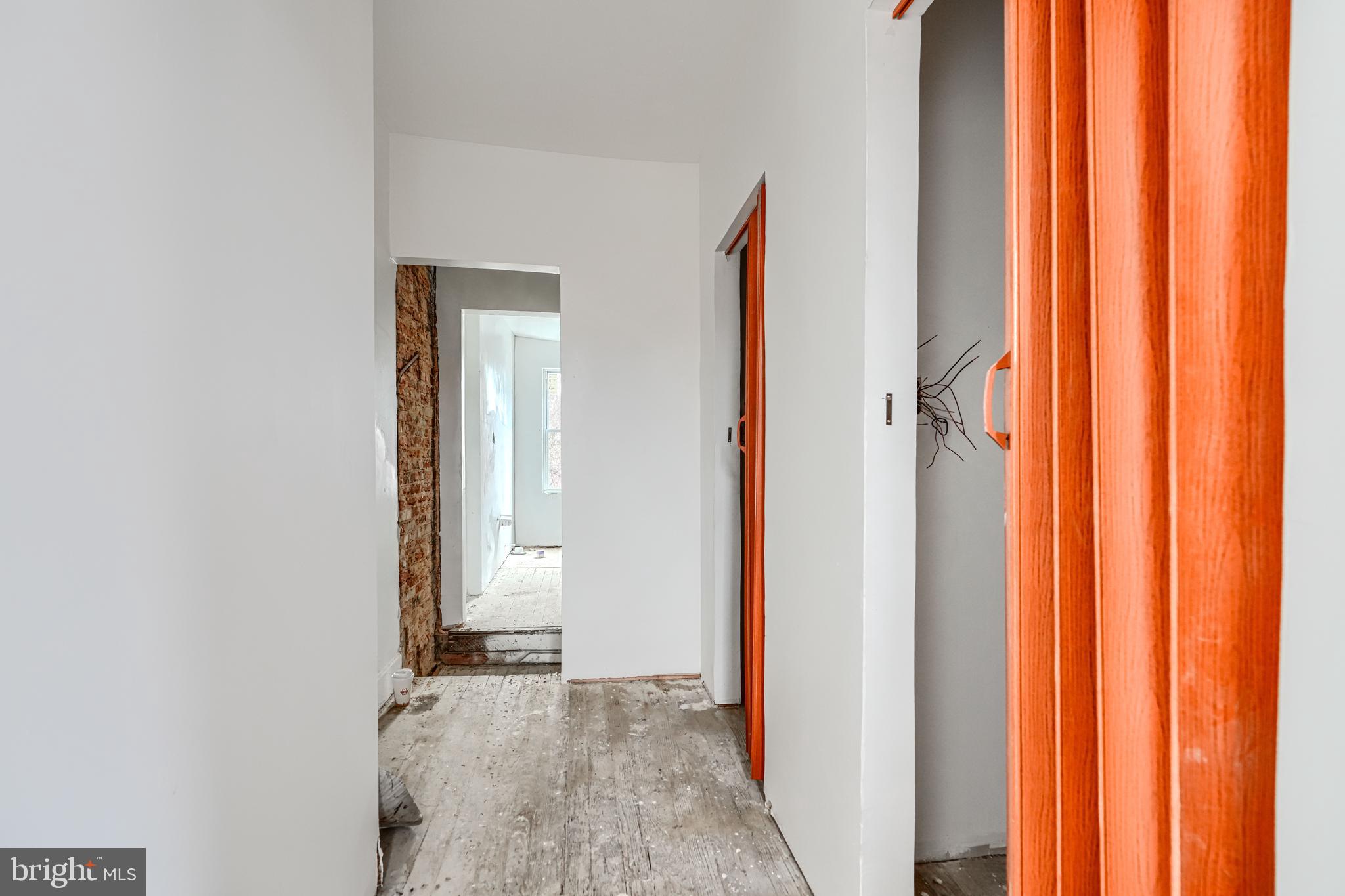 1312 Aisquith Street Baltimore, MD 21202 - Photo 22 of 25 a view of an empty room and window