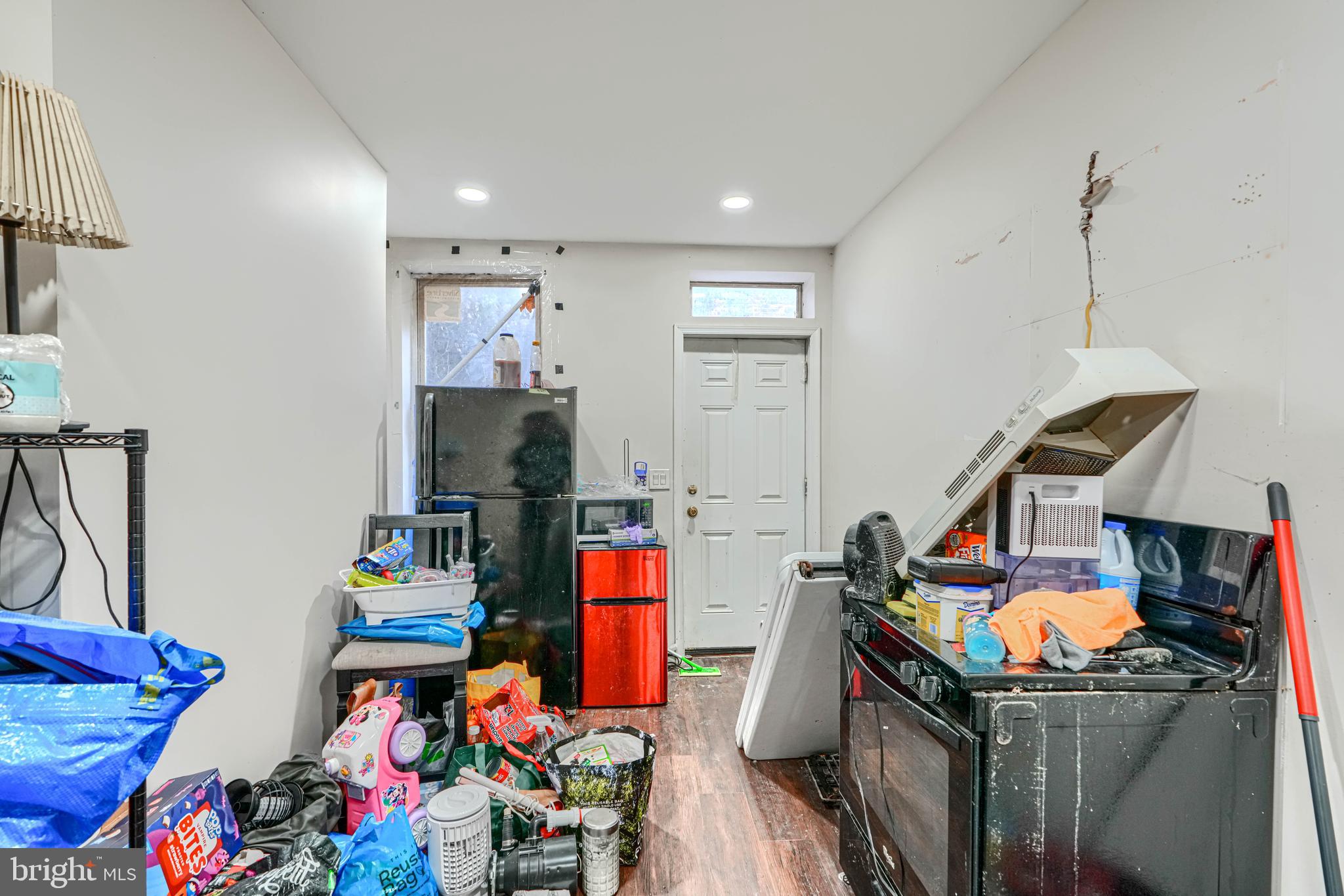 1312 Aisquith Street Baltimore, MD 21202 - Photo 7 of 25 a living room with furniture and a flat screen tv