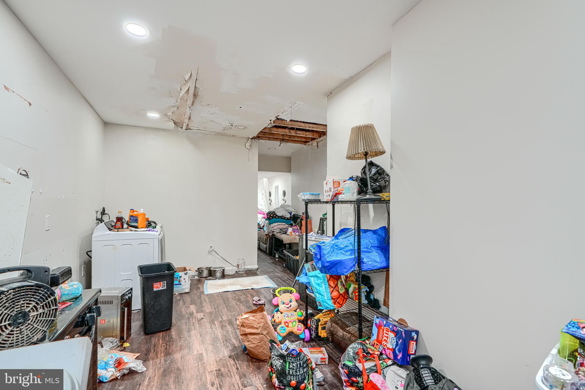 1312 Aisquith Street Baltimore, MD 21202 - Photo 8 of 25 a room with toys and wooden floor