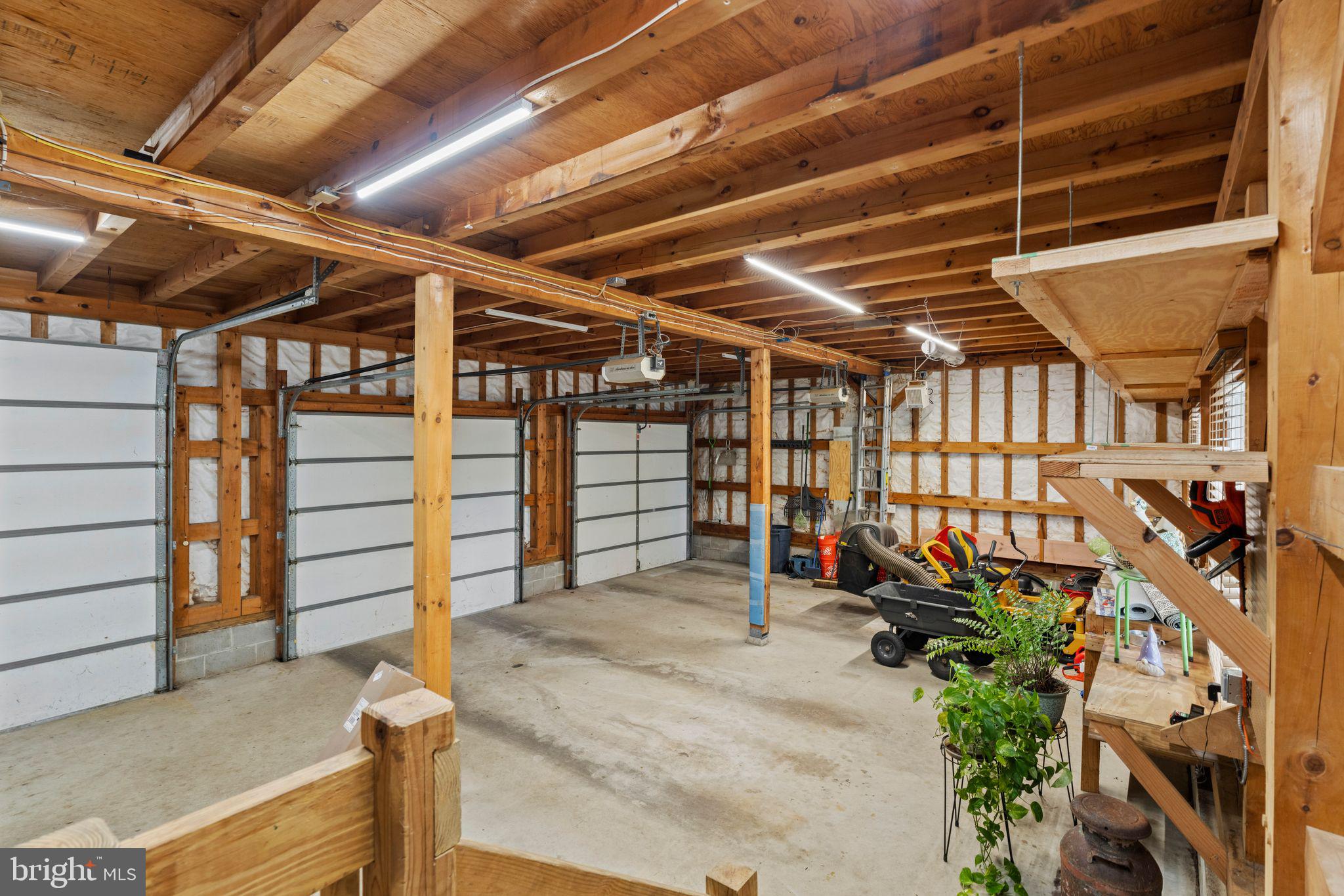 16 Dunhill Road Jackson, NJ 08527 - Photo 30 of 44 Spacious garage with wooden beams.