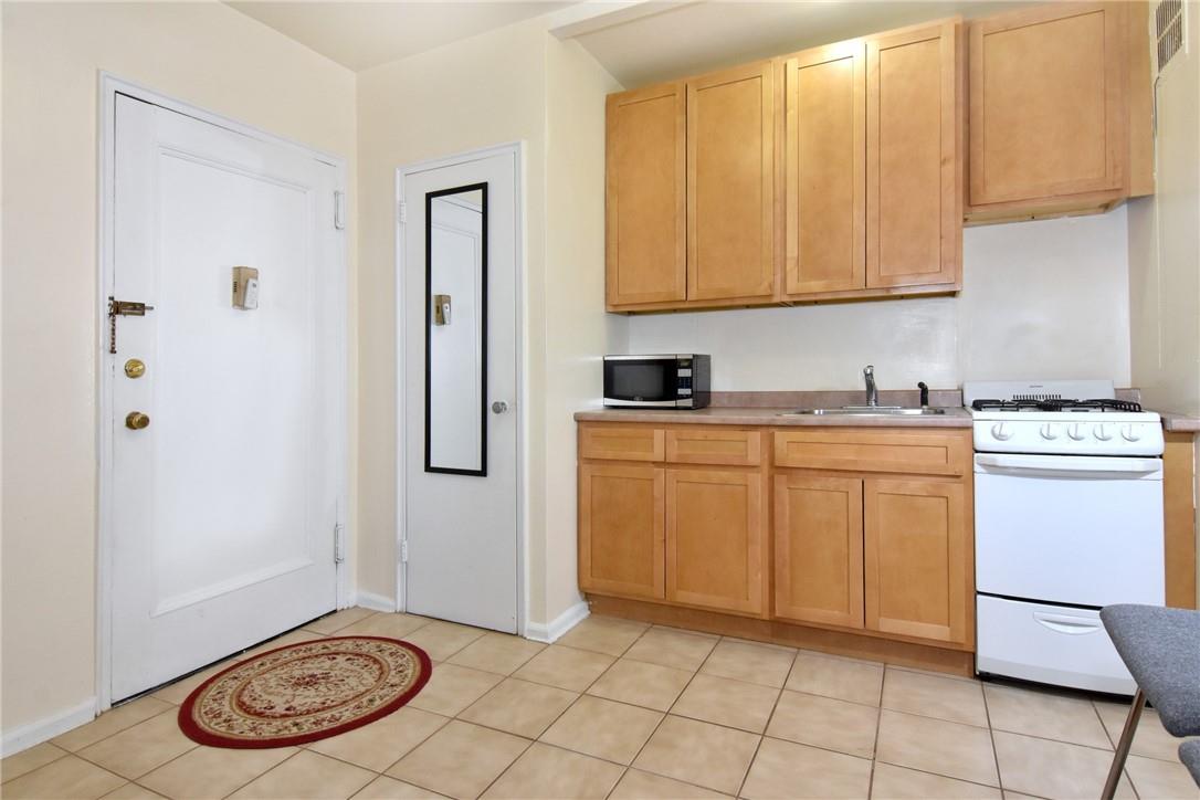 796 Bronx River Road, Unit B54 Bronxville, NY 10708 - Photo 1 of 1 Enter into lovely kitchen with closet and tiled floor.