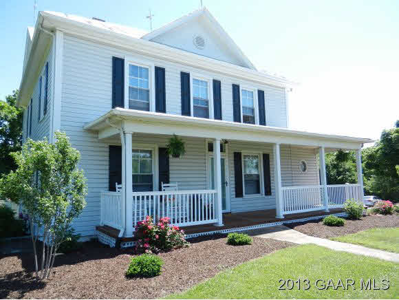 48 Buttermilk Road Mount Sidney, VA 24467 - Photo 1 of 24 a front view of a house with garden