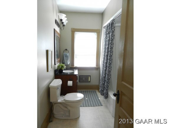 48 Buttermilk Road Mount Sidney, VA 24467 - Photo 16 of 24 a bathroom with a toilet a sink and mirror