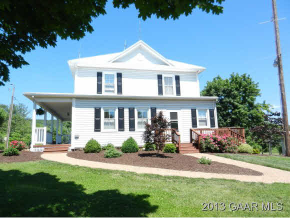 48 Buttermilk Road Mount Sidney, VA 24467 - Photo 2 of 24 a front view of a house with a yard and potted plants