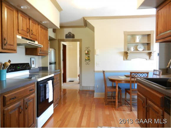 48 Buttermilk Road Mount Sidney, VA 24467 - Photo 8 of 24 a kitchen with stainless steel appliances granite countertop a stove and a refrigerator