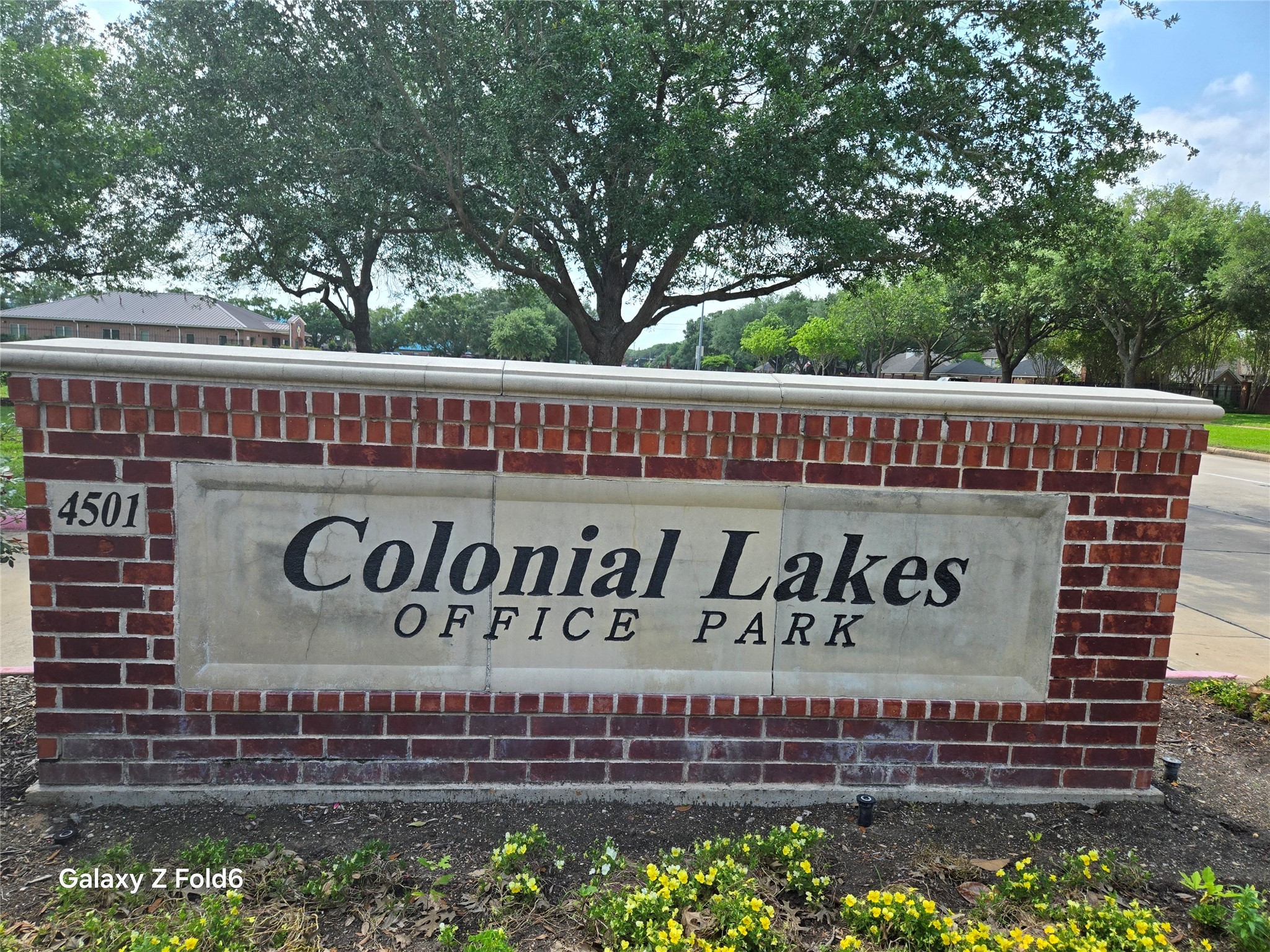 4501 Cartwright Road Missouri City, TX 77459 - Photo 5 of 6 a sign on the side of a building