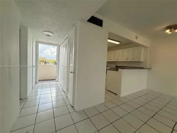 a view of a storage & utility room in a house