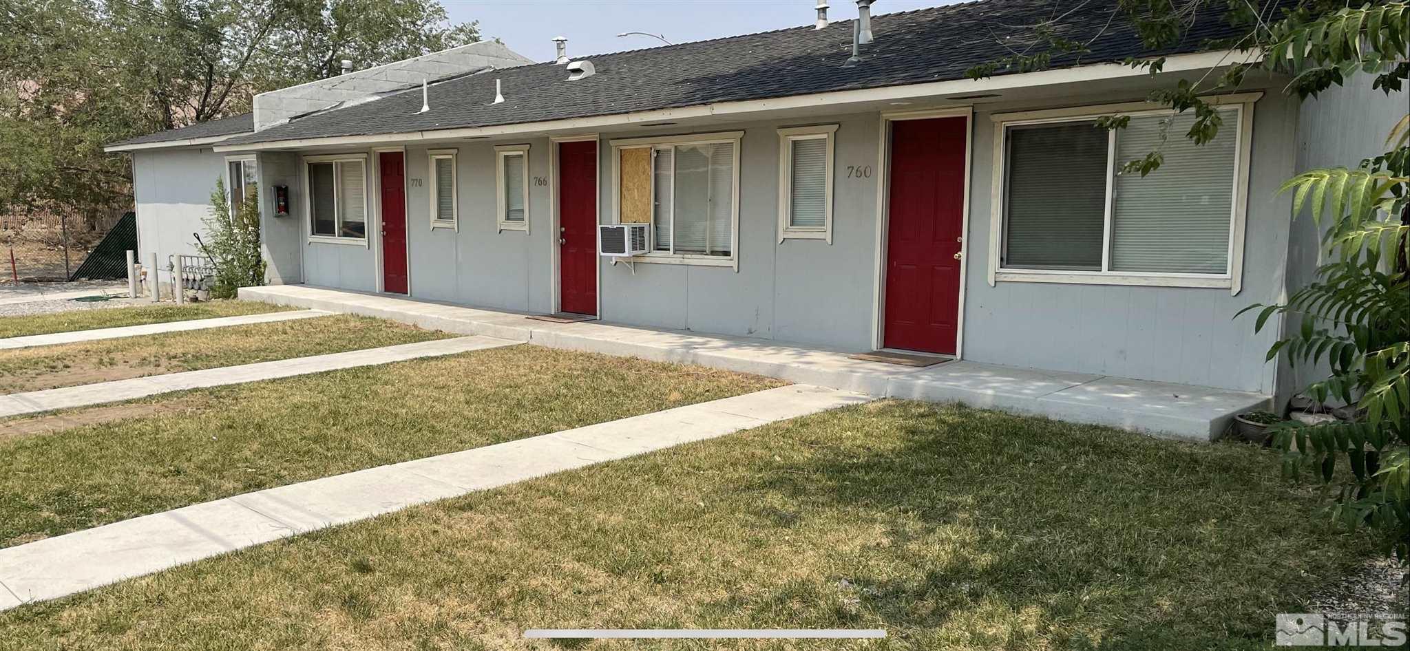 770 Montello Street Reno, NV 89512 - Photo 1 of 10 a front view of a house with a yard