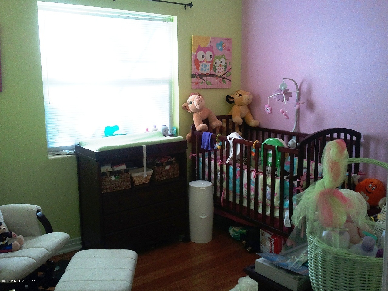2133 Newberry Road Jacksonville, FL 32218 - Photo 14 of 29 a bedroom with furniture and wooden floor