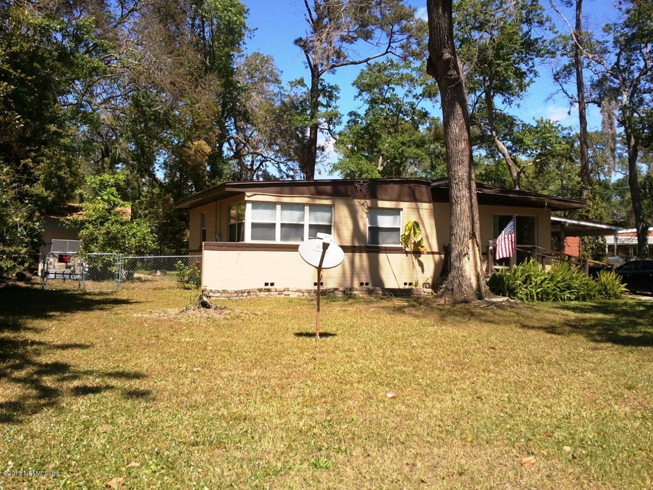 2133 Newberry Road Jacksonville, FL 32218 - Photo 21 of 29 front view of a house with a yard