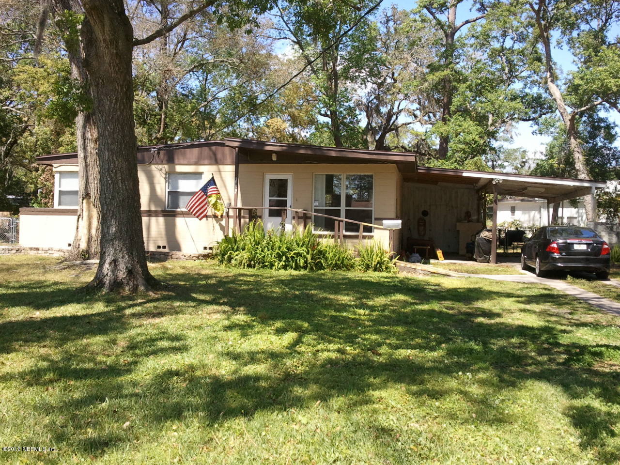 2133 Newberry Road Jacksonville, FL 32218 - Photo 27 of 29 a house view with a sitting space and a backyard space