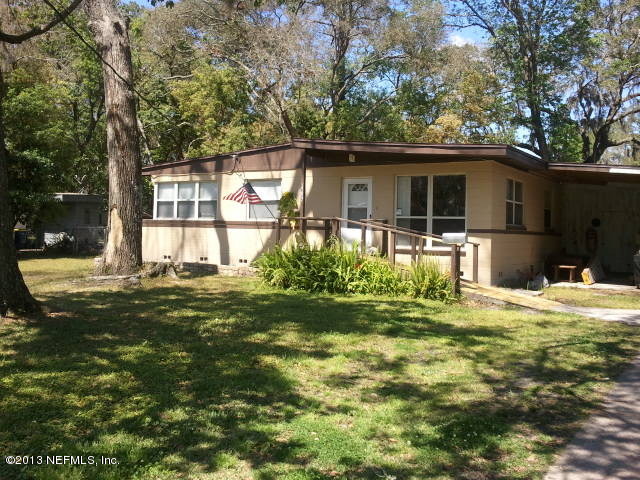 2133 Newberry Road Jacksonville, FL 32218 - Photo 28 of 29 a front view of a house with a yard