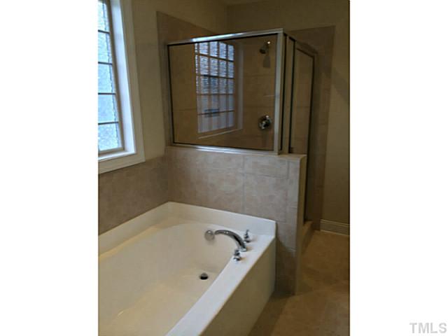 7537 Channery Way, Unit LT39 Raleigh, NC 27616 - Photo 11 of 16 Separate tub with tiled shower in owner's bath!