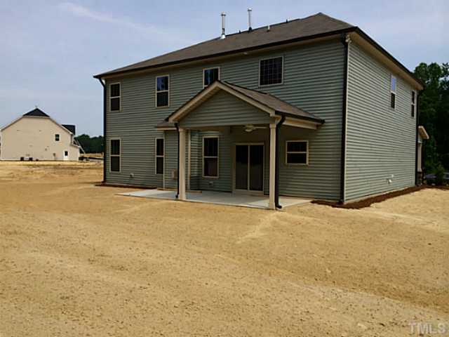 7537 Channery Way, Unit LT39 Raleigh, NC 27616 - Photo 14 of 16 Covered deck and big back yard. Home to have Bermuda Sod.