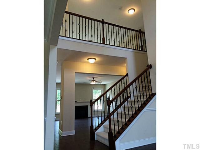 7537 Channery Way, Unit LT39 Raleigh, NC 27616 - Photo 4 of 16 Wow! Impressive 2 story foyer open to loft with lots of wrought iron railing.