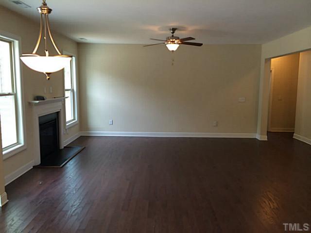 7537 Channery Way, Unit LT39 Raleigh, NC 27616 - Photo 7 of 16 Family room has hardwoods and gas fireplace!