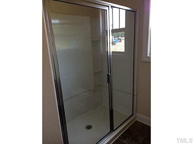 7537 Channery Way, Unit LT39 Raleigh, NC 27616 - Photo 8 of 16 1st floor bath has walk in shower.